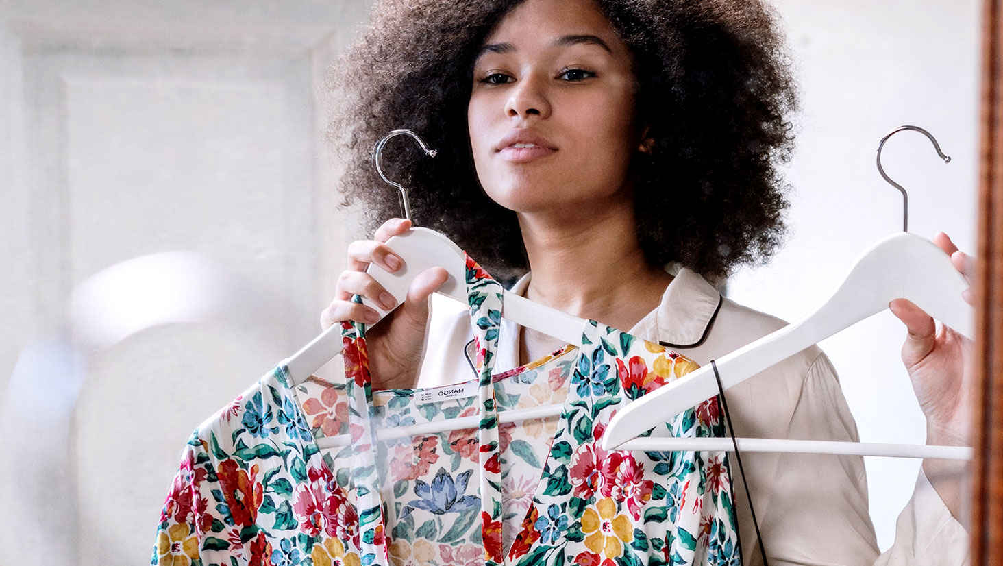 Woman Looking at Clothes Woman Looking at Clothes